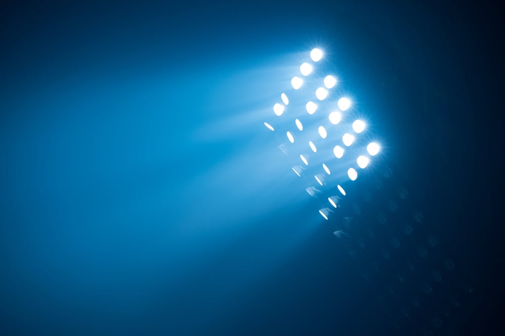 soccer stadium lights reflectors against black background-1